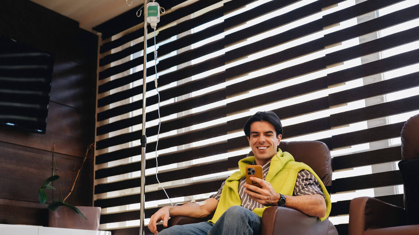 Man receiving intravenous vitamin therapy in