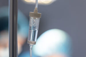 Close-up image of an IV drip in the operating room at an outpatient infusion center.