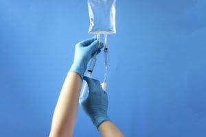 Drug bag with a infusion set connected to delivery the drug to the patient.